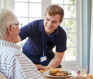 nurse talking to elder