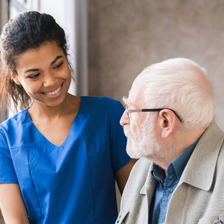 nurse helping senior