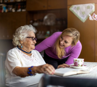 nurse comforting senior