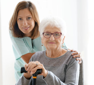 nurse smiling with senior