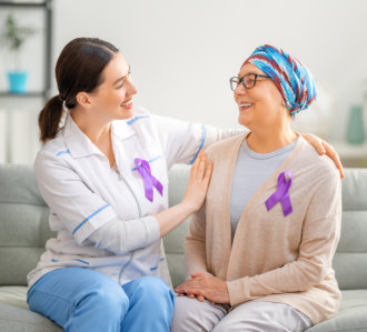 female nurse caring a elderly woman