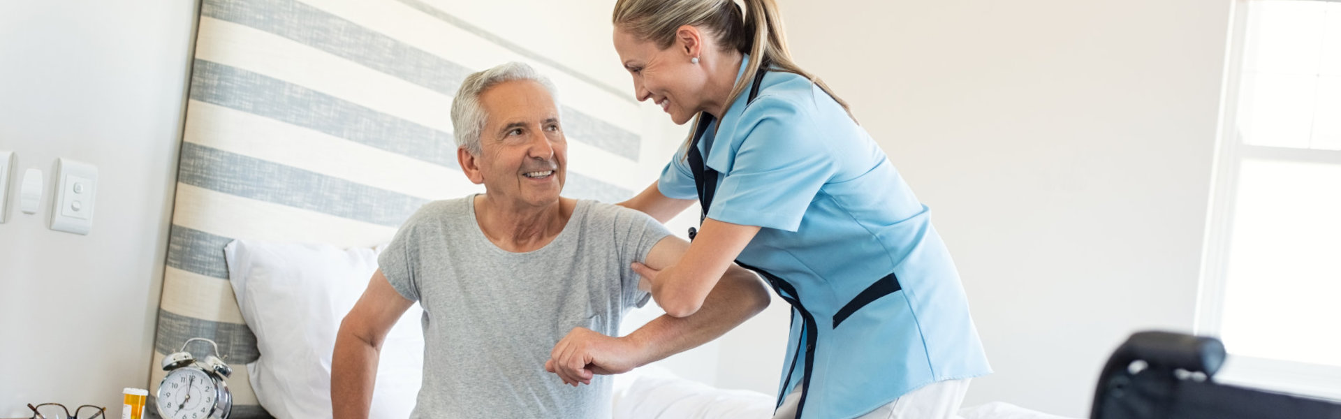 nurse helping senior